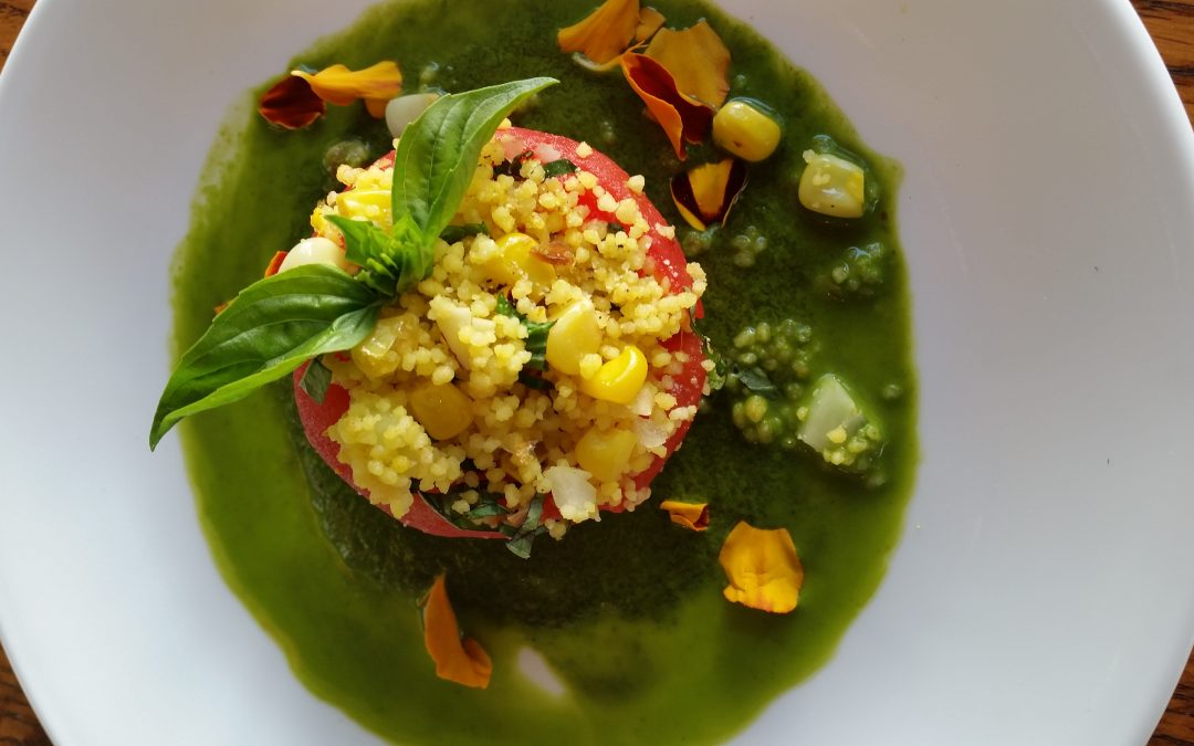 Stuffed Heirloom Tomatoes with Cous Cous, Corn, Almonds, Basil, and Cilantro Puree